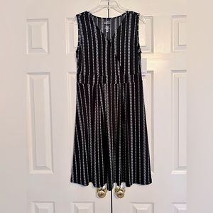 New Black dress with white accents, sleeveless, Size S.